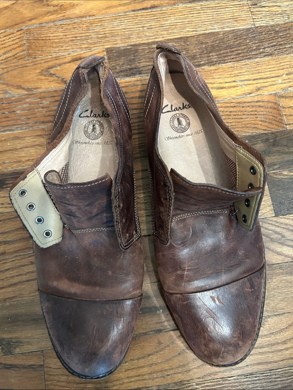 Clarks Brown Leather Slip-On Loafers with Tan Eyelet Accents